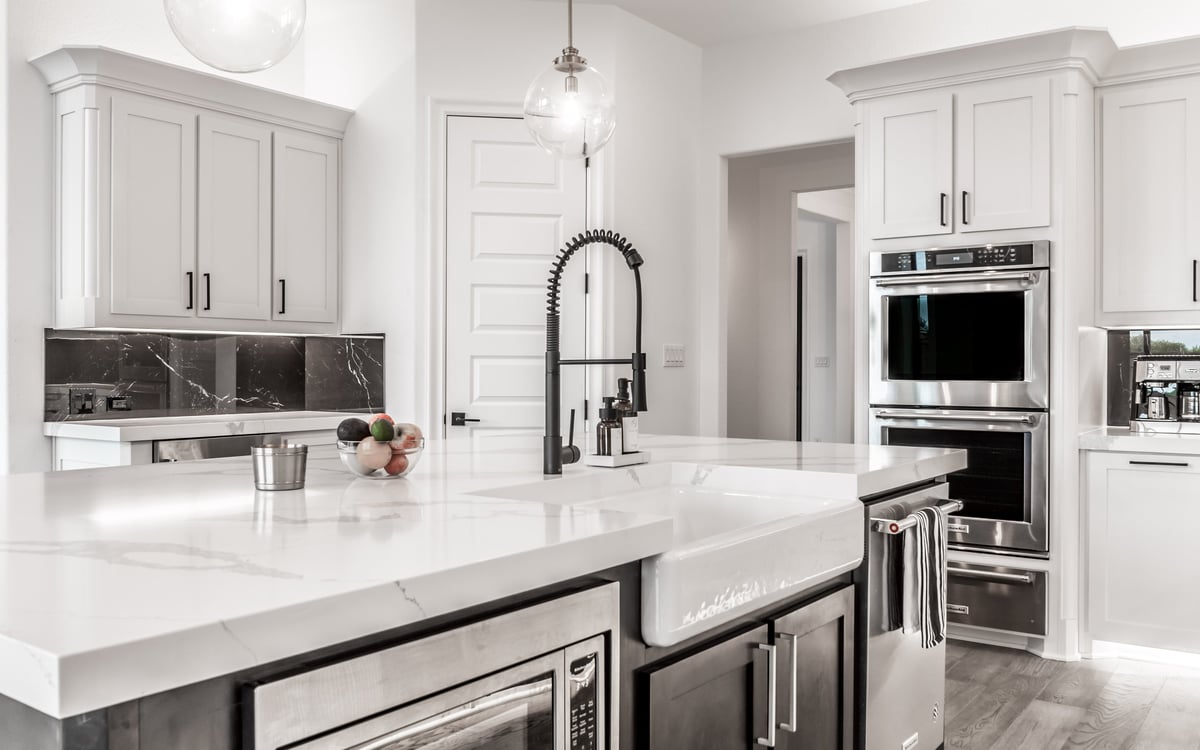 Modern white kitchen with custom cabinetry