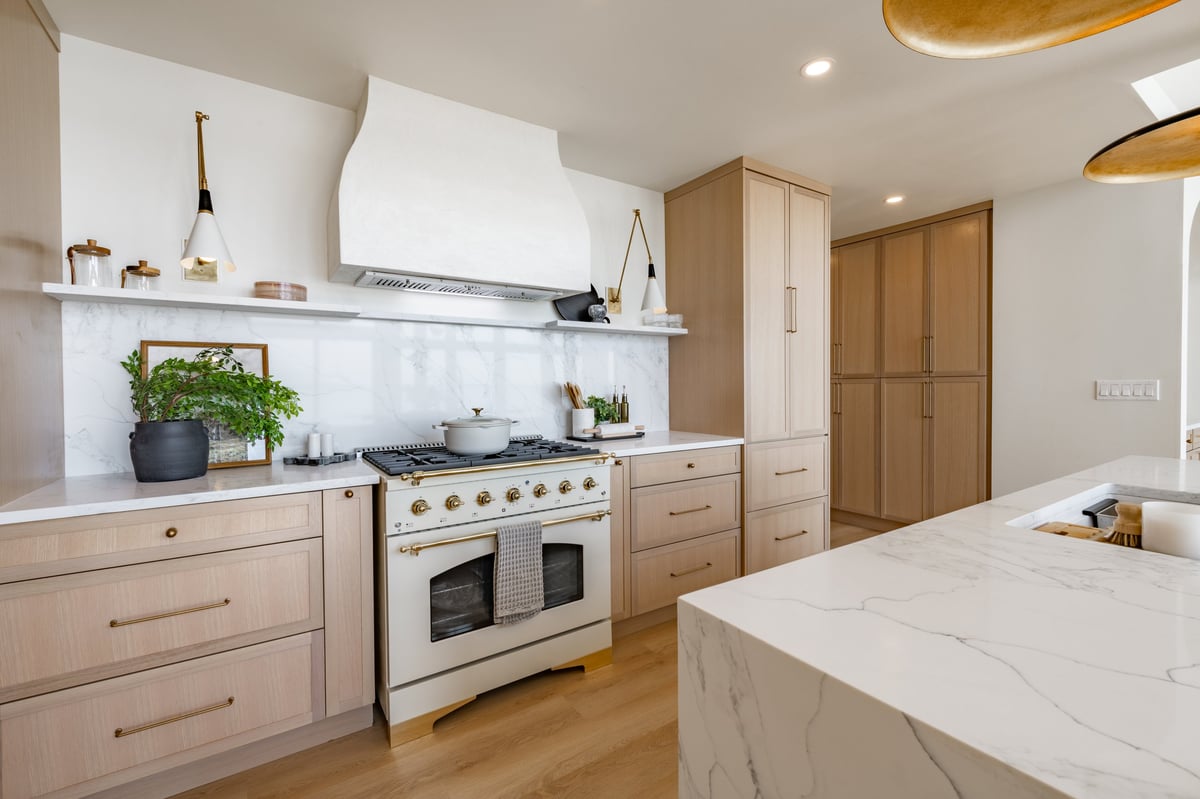 Modern luxury kitchen with elegant finishes and natural lighting