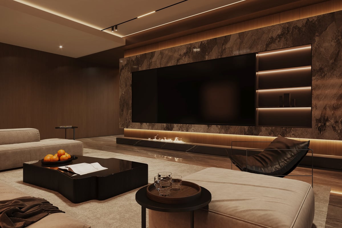 Luxurious finished basement living room with modern fireplace and TV