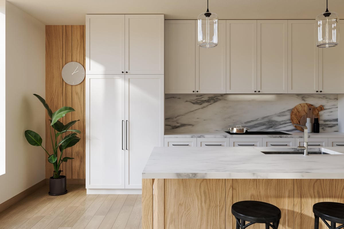 Modern white kitchen with custom cabinets and marble island