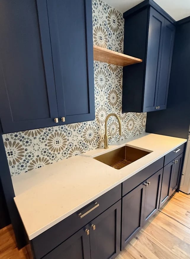 Modern kitchen with custom cabinetry and elegant finishes